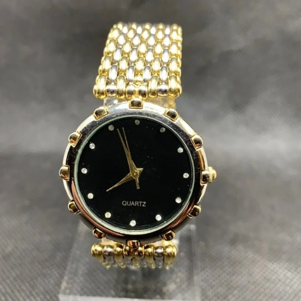 3/$27  Fashion watch with subtle two tone band